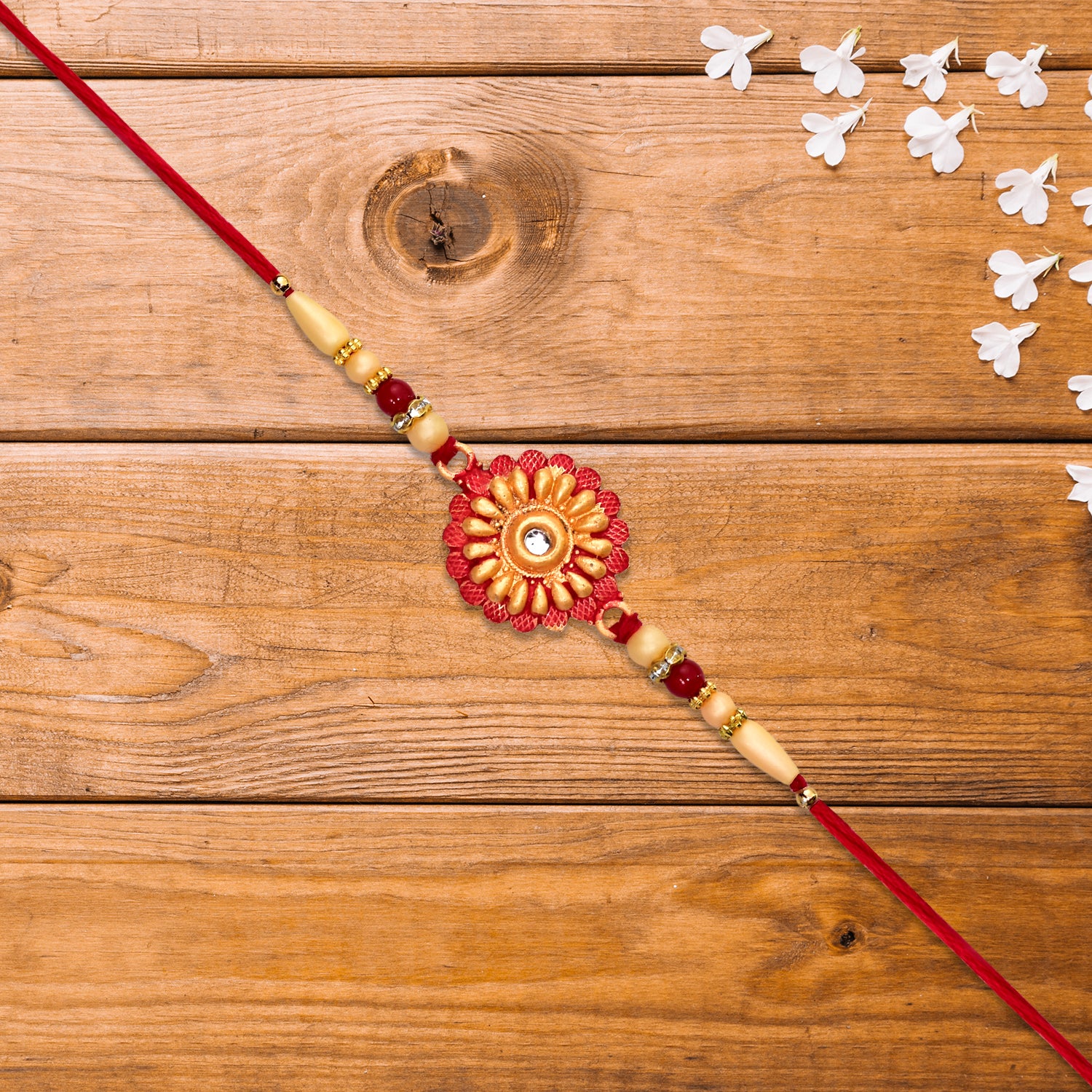 Floral Bead Rakhi With Central Stone Floral Bead Rakhi With Central Stone